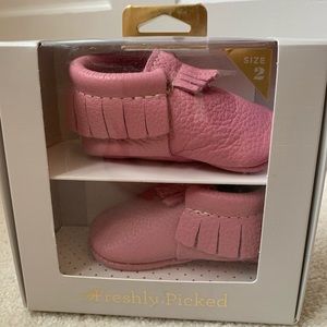 Freshly picked pink moccasins, new in box.…